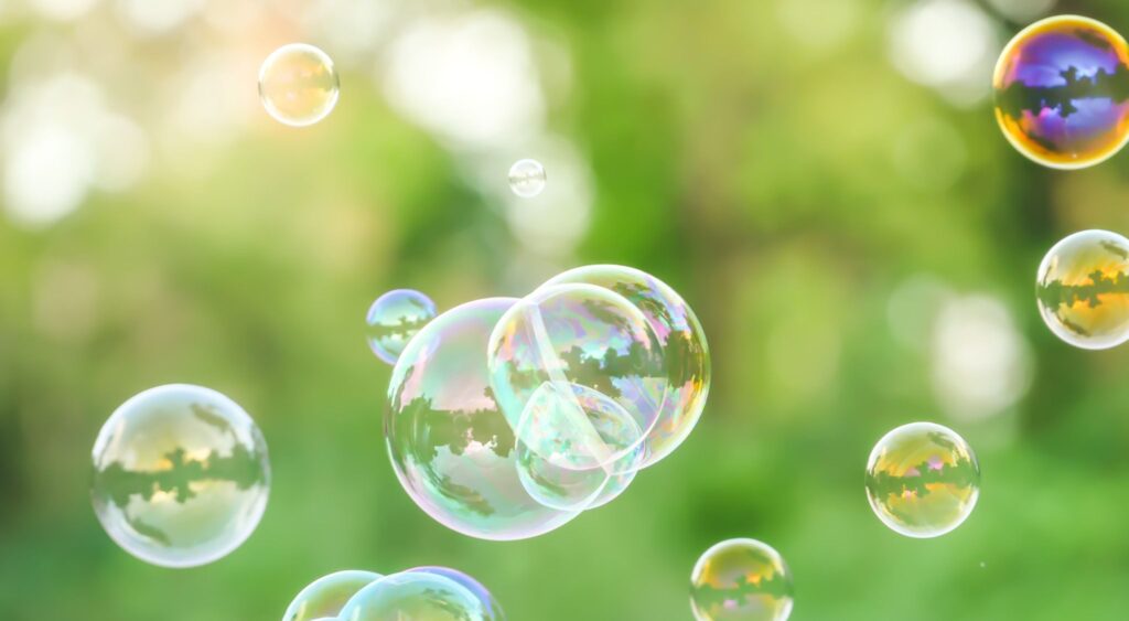 soap bubbles on green nature background